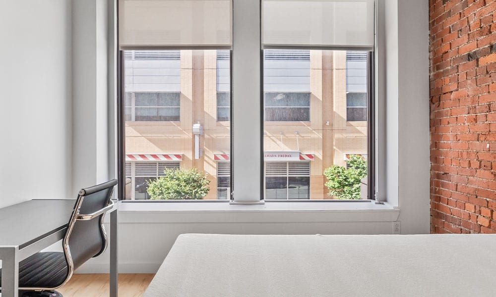 Bedroom area in an apartment at Union on 5th