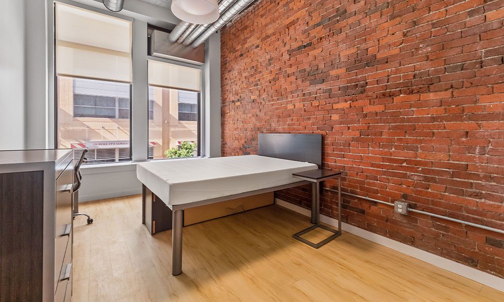 Bedroom area in an apartment at Union on 5th