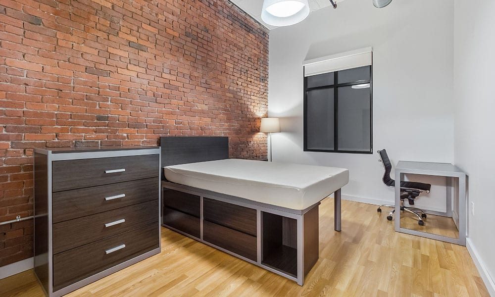 Bedroom area in an apartment at Union on 5th