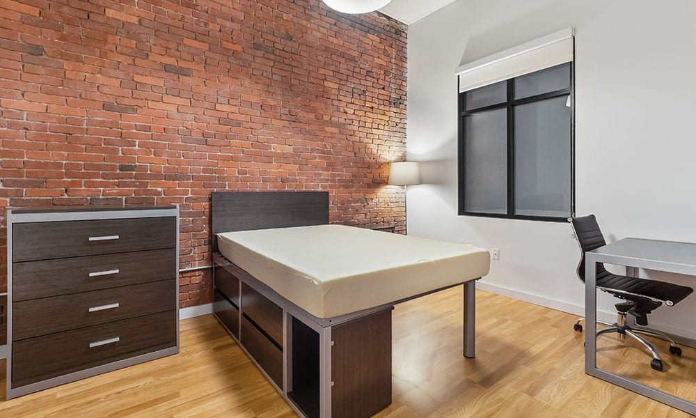 Bedroom area in an apartment at Union on 5th